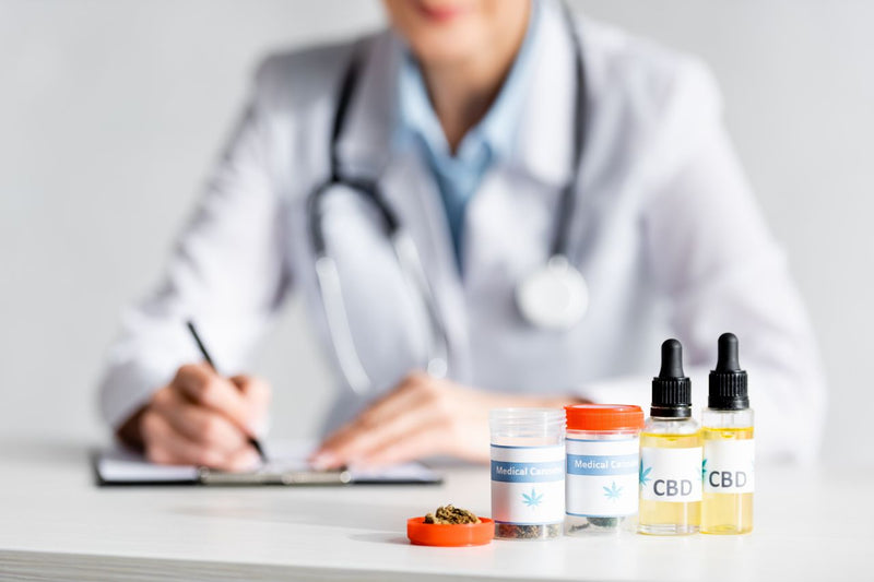 cannabis products in front of a doctor