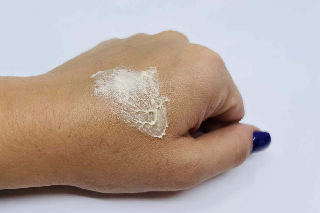 CBD cream spread thinly over the back of a hand and knuckles